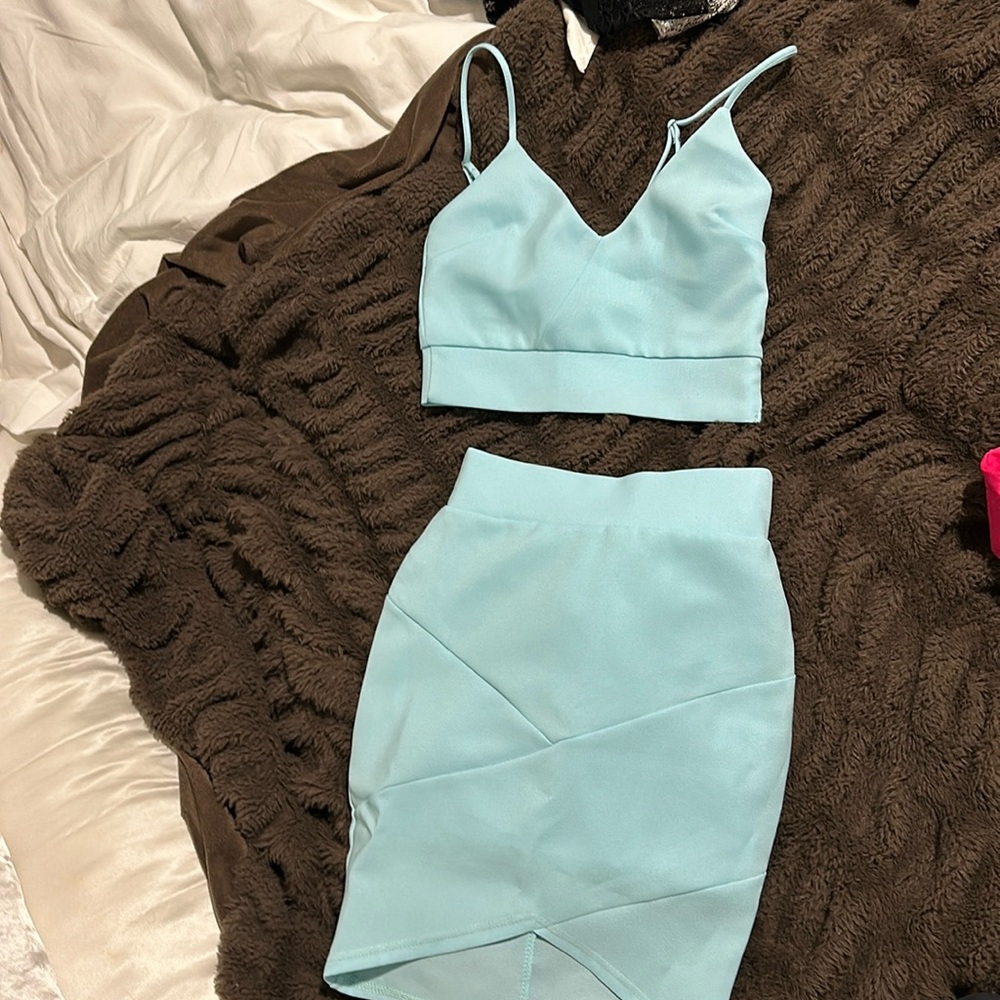 Never worn blue crop top and skirt set